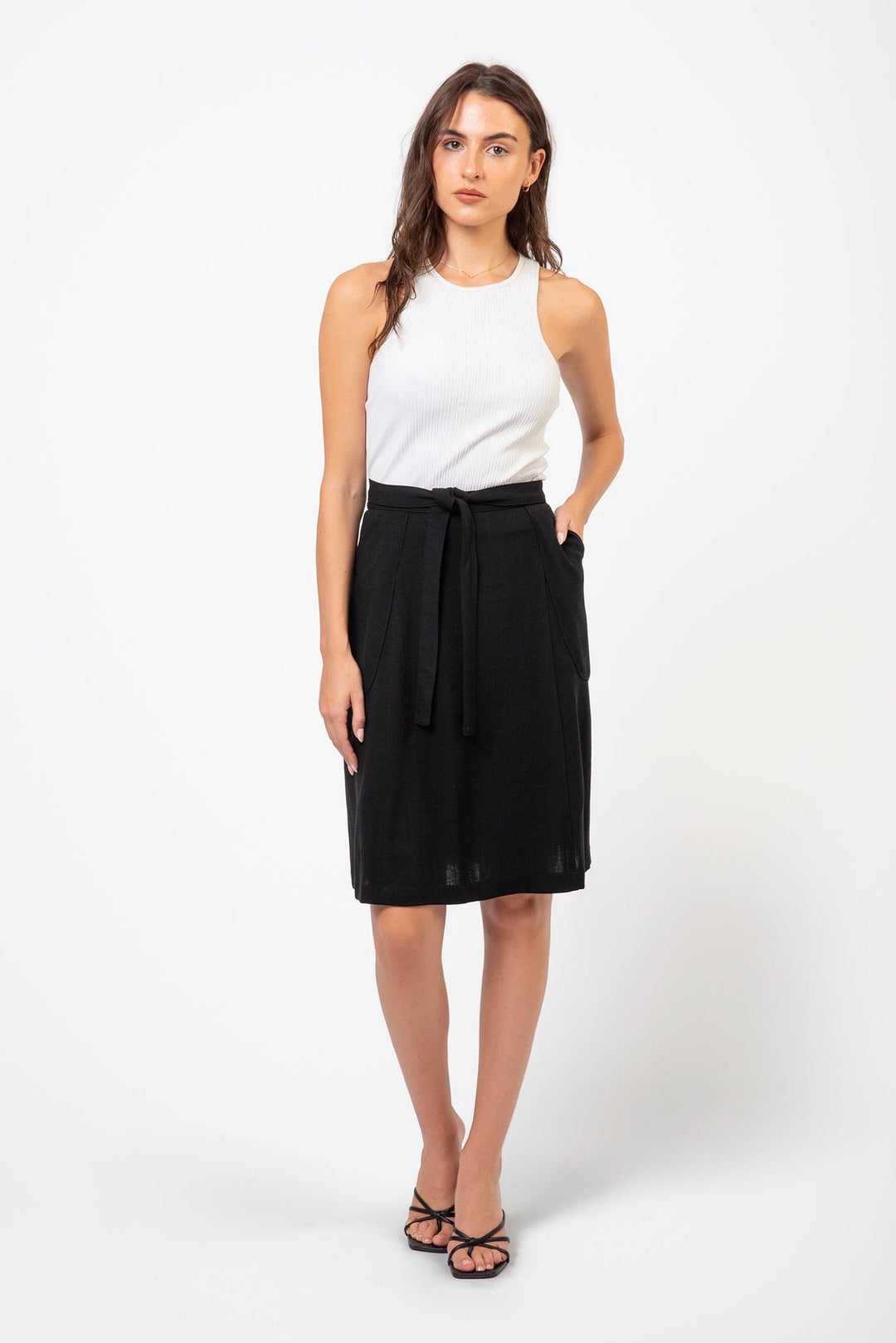 Knee-length linen and rayon wrap skirt from Cameo Clothing Line, featuring a stylish, flowy design and neutral color.