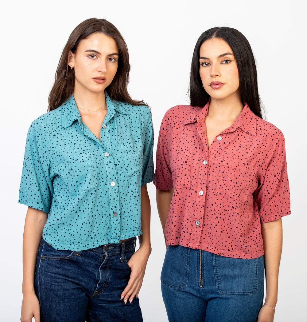 Cameo Clothing Line mash blouse in spot print, long-sleeve shirt with button front and relaxed fit, styled on a hanger.