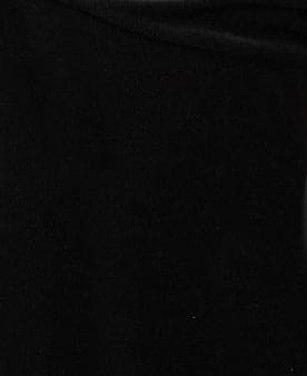 Black Wanda Cords pants by Cameo Clothing Line, showcasing a stylish fit and textured fabric in a close-up view.